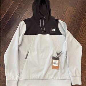 The North Face Black and Light Blue Jacket